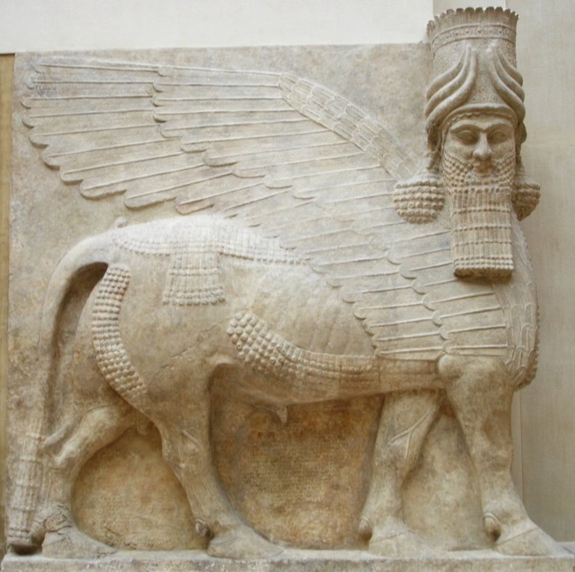 Human headed winged bull facing larger